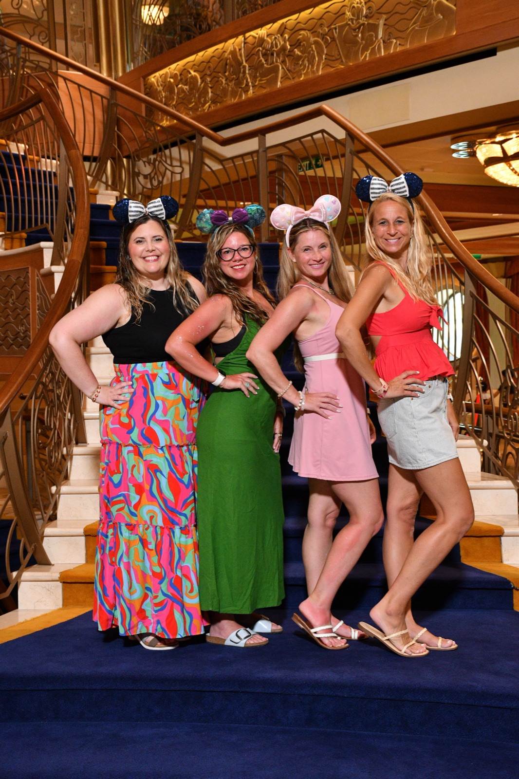 The Disney Dream cruise ship grand staircase, photographed by Fairytale Dreamers Travel on a Caribbean sailing.