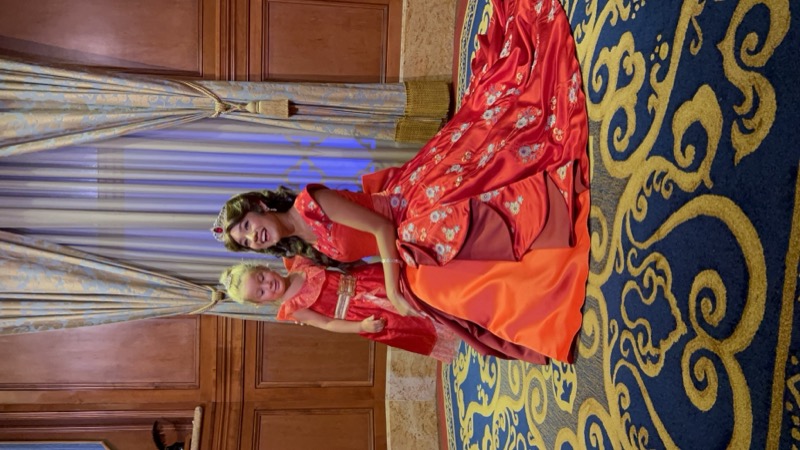 The yellow ballgown — floor-length with off-shoulder neckline.